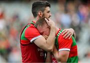 11 September 2021; Ryan O'Donoghue of Mayo is consoled by team-mate Brendan Harrison after the GAA Football All-Ireland Senior Championship Final match between Mayo and Tyrone at Croke Park in Dublin. Photo by Brendan Moran/Sportsfile