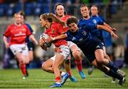 11 September 2021; Aoife Doyle of Munster is tackled by Jenny Murphy of Leinster during the Vodafone Women’s Interprovincial Championship Round 3 match between Leinster and Munster at Energia Park in Dublin. Photo by Harry Murphy/Sportsfile