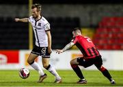 11 September 2021; Cameron Dummigan of Dundalk in action against Shane Elworthy of Longford Town during the SSE Airtricity League Premier Division match between Longford Town and Dundalk at Bishopsgate in Longford. Photo by Michael P Ryan/Sportsfile