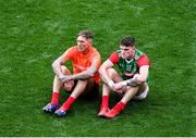 11 September 2021; Mayo selector Ciarán McDonald, left, and Jordan Flynn sit on the field after the GAA Football All-Ireland Senior Championship Final match between Mayo and Tyrone at Croke Park in Dublin. Photo by Daire Brennan/Sportsfile