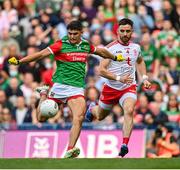 11 September 2021; Tommy Conroy of Mayo in action against Pádraig Hampsey of Tyrone during the GAA Football All-Ireland Senior Championship Final match between Mayo and Tyrone at Croke Park in Dublin. Photo by Seb Daly/Sportsfile
