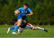 11 September 2021; Ben Brownlee of Leinster is tackled by Charlie Irvine of Ulster during the Development Interprovincial match between Leinster XV and Ulster XV at the IRFU High Performance Centre, on the Sport Ireland Campus in Dublin. Photo by Seb Daly/Sportsfile
