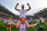 11 September 2021; Frank Burns is held aloft in celebration by his Tyrone team-mate Hugh Pat McGeary following the GAA Football All-Ireland Senior Championship Final match between Mayo and Tyrone at Croke Park in Dublin. Photo by Stephen McCarthy/Sportsfile