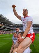 11 September 2021; Cathal McShane is held aloft in celebration by his Tyrone team-mate Kieran McGeary following the GAA Football All-Ireland Senior Championship Final match between Mayo and Tyrone at Croke Park in Dublin. Photo by Stephen McCarthy/Sportsfile