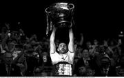 11 September 2021; (EDITOR'S NOTE; Image has been converted to black & white) Tyrone captain Pádraig Hampsey lifts the Sam Maguire Cup following the GAA Football All-Ireland Senior Championship Final match between Mayo and Tyrone at Croke Park in Dublin. Photo by Stephen McCarthy/Sportsfile