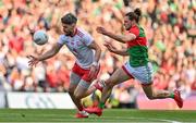 11 September 2021; Matthew Donnelly of Tyrone is tackled by Pádraig O'Hora of Mayo during the GAA Football All-Ireland Senior Championship Final match between Mayo and Tyrone at Croke Park in Dublin. Photo by Brendan Moran/Sportsfile