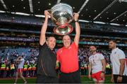 11 September 2021; Tyrone joint-managers Brian Dooher, left, and Feargal Logan celebrate with the Sam Maguire Cup following the GAA Football All-Ireland Senior Championship Final match between Mayo and Tyrone at Croke Park in Dublin. Photo by Stephen McCarthy/Sportsfile