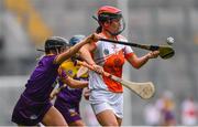 12 September 2021; Bernie Murray of Armagh in action against Aoife Dunne of Wexford during the All-Ireland Premier Junior Camogie Championship Final match between Armagh and Wexford at Croke Park in Dublin. Photo by Ben McShane/Sportsfile