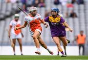 12 September 2021; Eimear Smyth of Armagh in action against Clodagh Jackman of Wexford during the All-Ireland Premier Junior Camogie Championship Final match between Armagh and Wexford at Croke Park in Dublin. Photo by Ben McShane/Sportsfile