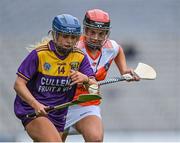 12 September 2021; Emma Codd of Wexford in action against Nicola Woods of Armagh during the All-Ireland Premier Junior Camogie Championship Final match between Armagh and Wexford at Croke Park in Dublin. Photo by Piaras Ó Mídheach/Sportsfile