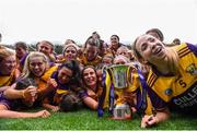 12 September 2021; Wexford players celebrate with The Kathleen Mills Cup after the All-Ireland Premier Junior Camogie Championship Final match between Armagh and Wexford at Croke Park in Dublin. Photo by Ben McShane/Sportsfile