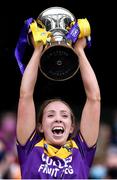 12 September 2021; Wexford captain Ciara Donohoe lifts the Kathleen Mills Cup after All-Ireland Premier Junior Camogie Championship Final match between Armagh and Wexford at Croke Park in Dublin. Photo by Piaras Ó Mídheach/Sportsfile