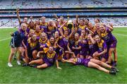 12 September 2021; Wexford players celebrate after their side's victory in the All-Ireland Premier Junior Camogie Championship Final match between Armagh and Wexford at Croke Park in Dublin. Photo by Piaras Ó Mídheach/Sportsfile