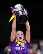 12 September 2021; Wexford captain Ciara Donohoe lifts the Kathleen Mills Cup after All-Ireland Premier Junior Camogie Championship Final match between Armagh and Wexford at Croke Park in Dublin. Photo by Piaras Ó Mídheach/Sportsfile