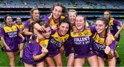 12 September 2021; Wexford players celebrate after their side's victory in the All-Ireland Premier Junior Camogie Championship Final match between Armagh and Wexford at Croke Park in Dublin. Photo by Piaras Ó Mídheach/Sportsfile
