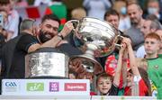 11 September 2021; Tyrone selector Joe McMahon and family celebrate with Sam Maguire Cup following the GAA Football All-Ireland Senior Championship Final match between Mayo and Tyrone at Croke Park in Dublin. Photo by Stephen McCarthy/Sportsfile