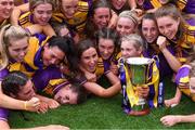 12 September 2021; Wexford players celebrate after their side's victory in the All-Ireland Premier Junior Camogie Championship Final match between Armagh and Wexford at Croke Park in Dublin. Photo by Piaras Ó Mídheach/Sportsfile