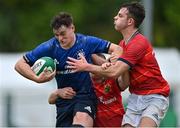 12 September 2021; Richard Whelan of Leinster is tackled by Harry Long and Matthew O’Callaghan of Munster during the PwC U18 Men’s Interprovincial Championship Round 2 match between Leinster and Munster at MU Barnhall in Leixlip, Kildare. Photo by Brendan Moran/Sportsfile