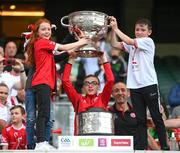 11 September 2021; Tyrone joint-manager Brian Dooher and family celebrate with the Sam Maguire Cup following the GAA Football All-Ireland Senior Championship Final match between Mayo and Tyrone at Croke Park in Dublin. Photo by Stephen McCarthy/Sportsfile
