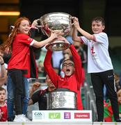 11 September 2021; Tyrone joint-manager Brian Dooher and family celebrate with the Sam Maguire Cup following the GAA Football All-Ireland Senior Championship Final match between Mayo and Tyrone at Croke Park in Dublin. Photo by Stephen McCarthy/Sportsfile