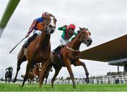 12 September 2021; La Petite Coco, right, with Billy Lee up, on their way to winning the Moyglare 'Jewels' Blandford Stakes, from second place Love, left, with Ryan Moore up, during day two of the Longines Irish Champions Weekend at The Curragh Racecourse in Kildare. Photo by Seb Daly/Sportsfile