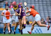 12 September 2021; Ciara Banville of Wexford in action against Nicola Woods of Armagh during the All-Ireland Premier Junior Camogie Championship Final match between Armagh and Wexford at Croke Park in Dublin. Photo by Piaras Ó Mídheach/Sportsfile