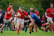 12 September 2021; Jake O’Riordan of Munster is tackled by Jules Fenelon of Leinster during the PwC U18 Men’s Interprovincial Championship Round 2 match between Leinster and Munster at MU Barnhall in Leixlip, Kildare. Photo by Brendan Moran/Sportsfile