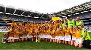 12 September 2021; Antrim players and staff celebrate with the Jack McGrath cup after the All-Ireland Intermediate Camogie Championship Final match between Antrim and Kilkenny at Croke Park in Dublin. Photo by Ben McShane/Sportsfile