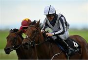 12 September 2021; Discoveries, right, with Shane Foley up, on their way to winning the Moyglare Stud Stakes, from second place Agartha, with Declan McDonogh up, during day two of the Longines Irish Champions Weekend at The Curragh Racecourse in Kildare. Photo by Seb Daly/Sportsfile