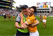 12 September 2021; Antrim joint-manager Paul McKillen and Maeve Connolly of Antrim celebrate after their victory in the All-Ireland Intermediate Camogie Championship Final match between Antrim and Kilkenny at Croke Park in Dublin. Photo by Ben McShane/Sportsfile