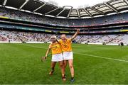 12 September 2021; Antrim goalkeeper Catrina Graham, left, and Caoimhe Conlon celebrate after their side's victory in the All-Ireland Intermediate Camogie Championship Final match between Antrim and Kilkenny at Croke Park in Dublin. Photo by Ben McShane/Sportsfile