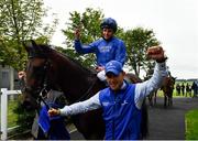 12 September 2021; Jockey William Buick celebrates after riding Native Trail to victory in the Goffs Vincent O'Brien National Stakes during day two of the Longines Irish Champions Weekend at The Curragh Racecourse in Kildare. Photo by Seb Daly/Sportsfile