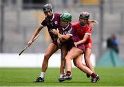 12 September 2021; Catherine Finnerty of Galway, supported by team-mate Siobhán Gardiner, left, in action against Ciara O'Sullivan of Cork during the All-Ireland Senior Camogie Championship Final match between Cork and Galway at Croke Park in Dublin. Photo by Ben McShane/Sportsfile