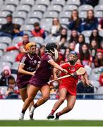 12 September 2021; Orla Cronin of Cork in action against Dervla Higgins, left, and Sarah Dervan of Galway during the All-Ireland Senior Camogie Championship Final match between Cork and Galway at Croke Park in Dublin. Photo by Ben McShane/Sportsfile