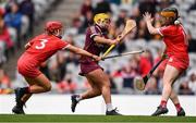 12 September 2021; Siobhán McGrath of Galway scores her side's first goal despite the efforts of Cork goalkeeper Amy Lee, right, and Libby Coppinger of Cork during the All-Ireland Senior Camogie Championship Final match between Cork and Galway at Croke Park in Dublin. Photo by Ben McShane/Sportsfile