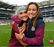 12 September 2021; Galway players Emma Helebert, left, and Heather Cooney celebrate after their side's victory in the All-Ireland Senior Camogie Championship Final match between Cork and Galway at Croke Park in Dublin. Photo by Piaras Ó Mídheach/Sportsfile