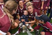 12 September 2021; Shauna Healy of Galway, 2, celebrates with her goddaughter Ellen Burke after the All-Ireland Senior Camogie Championship Final match between Cork and Galway at Croke Park in Dublin. Photo by Piaras Ó Mídheach/Sportsfile
