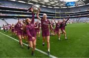 12 September 2021; Galway players Ava Lynskey, left, and Siobhán Gardiner celebrate with The O'Duffy Cup after the All-Ireland Senior Camogie Championship Final match between Cork and Galway at Croke Park in Dublin. Photo by Ben McShane/Sportsfile