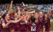 12 September 2021; Aoife Donoghue of Galway, 12, celebrates with the O'Duffy Cup after her side's victory in the All-Ireland Senior Camogie Championship Final match between Cork and Galway at Croke Park in Dublin. Photo by Piaras Ó Mídheach/Sportsfile