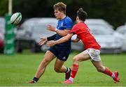 12 September 2021; Sam Berman of Leinster is tackled by Benjamin Lynch of Munster during the PwC U18 Men’s Interprovincial Championship Round 2 match between Leinster and Munster at MU Barnhall in Leixlip, Kildare. Photo by Brendan Moran/Sportsfile