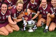 12 September 2021; Éanna Kelly, son of Galway physiotherapist Clíodhna Ní Choisdealbha, celebrates in the O'Duffy Cup after the All-Ireland Senior Camogie Championship Final match between Cork and Galway at Croke Park in Dublin. Photo by Piaras Ó Mídheach/Sportsfile