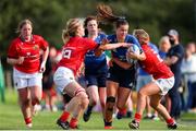 11 September 2021; Eva Sterrit of Leinster is tackled by Tova McMahon and Rebecca Rogers of Munster during the PwC U18 Women’s Interprovincial Championship Round 3 match between Leinster and Munster at MU Barnhall in Leixlip, Kildare. Photo by Michael P Ryan/Sportsfile