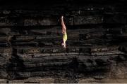 12 September 2021; A competitor dives during round four of the Red Bull Cliff Diving World Series at Downpatrick Head in Mayo. Photo by Ramsey Cardy/Sportsfile