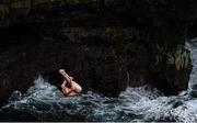 12 September 2021; Aidan Heslop of Great Britain during round four of the Red Bull Cliff Diving World Series at Downpatrick Head in Mayo. Photo by Ramsey Cardy/Sportsfile