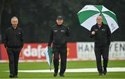 13 September 2021; Umpires, from left, Paul Reynolds, Mark Hawthorne and Alan Neill inspect the pitch before match three of the Dafanews International Cup ODI series between Ireland and Zimbabwe at Stormont in Belfast. Photo by Seb Daly/Sportsfile