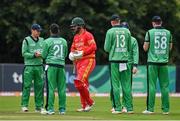13 September 2021; Brendan Taylor of Zimbabwe is given a guard of honour by Ireland players as he makes his way onto the field of play for his last international match beforeduring match three of the Dafanews International Cup ODI series between Ireland and Zimbabwe at Stormont in Belfast. Photo by Seb Daly/Sportsfile