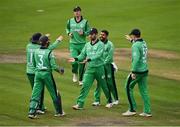 13 September 2021; Ireland players, including captain Andrew Balbirnie, centre, celebrate the run-out of Zimbabwe's Sikandar Raza, during match three of the Dafanews International Cup ODI series between Ireland and Zimbabwe at Stormont in Belfast. Photo by Seb Daly/Sportsfile