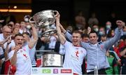 11 September 2021; Tyrone players, from left, Niall Kelly, Ben McDonnell and Darragh McAnenly lift the Sam Maguire Cup following the GAA Football All-Ireland Senior Championship Final match between Mayo and Tyrone at Croke Park in Dublin. Photo by Stephen McCarthy/Sportsfile