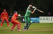 13 September 2021; Harry Tector of Ireland plays a shot to score the winning runs for his side during match three of the Dafanews International Cup ODI series between Ireland and Zimbabwe at Stormont in Belfast. Photo by Seb Daly/Sportsfile