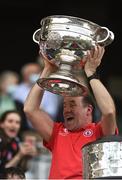 11 September 2021; Tyrone joint-manager Feargal Logan lifts the Sam Maguire Cup after the GAA Football All-Ireland Senior Championship Final match between Mayo and Tyrone at Croke Park in Dublin. Photo by Piaras Ó Mídheach/Sportsfile